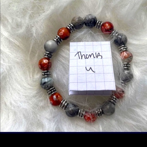 A cute orange and black kid bracelet or for women too - Picture 1 of 2